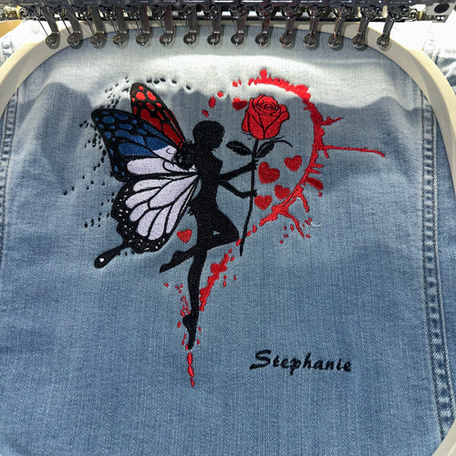 Butterfly and rose embroidery on denim